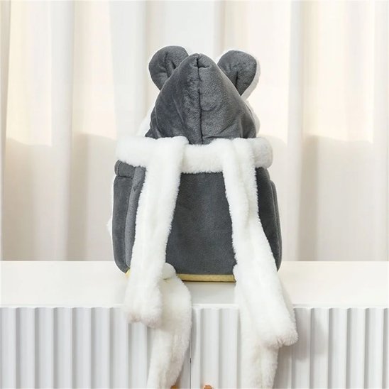 Sac de transport chien Cosy sac sur un meuble montrant les bretelles